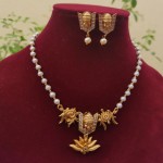 pearl-choker-with-lord-venkateshwara-pendent-and-earrings