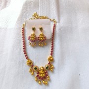 Antique ruby temple necklace